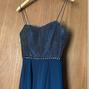 Selling this BRAND NEW prom dress because the boutique did not do returns